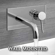 Wall mounted bath filler tap