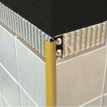 genesis-12mm-brushed-brass-aluminium-square-tile-trim-example.webp