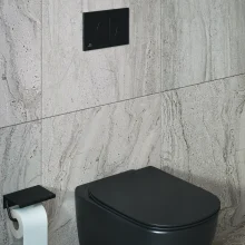 ideal-standard-oleas-m5-black-round-dual-flush-plate-lifestyle.webp
