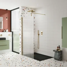 nuie-800mm-fluted-wetroom-screen-with-brushed-brass-support-bar-lifestyle.webp