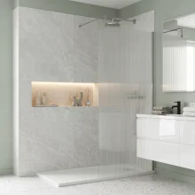 nuie-800mm-fluted-wetroom-screen-with-chrome-support-bar-lifestyle.webp