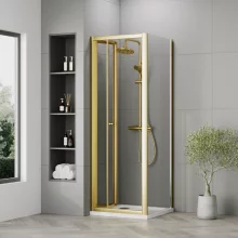 nuie-rene-brushed-brass-700mm-bifold-shower-door-square-enclosure-inc-side-panel-and-tray-lifestyle-2.webp