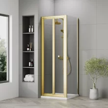 nuie-rene-brushed-brass-700mm-bifold-shower-door-square-enclosure-inc-side-panel-and-tray-lifestyle.webp