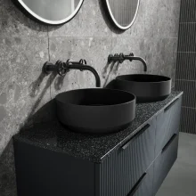 nuie-revolution-matt-black-wall-mounted-basin-mixer-lifestyle.webp