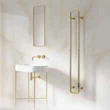 reina-pelmo-brushed-brass-radiator-lifestyle.jpg