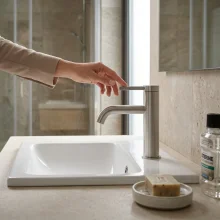 roca-ona-stainless-steel-finish-basin-mixer-tap-lifestyle.webp